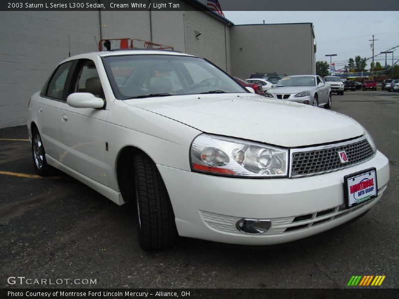 Cream White / Light Tan 2003 Saturn L Series L300 Sedan