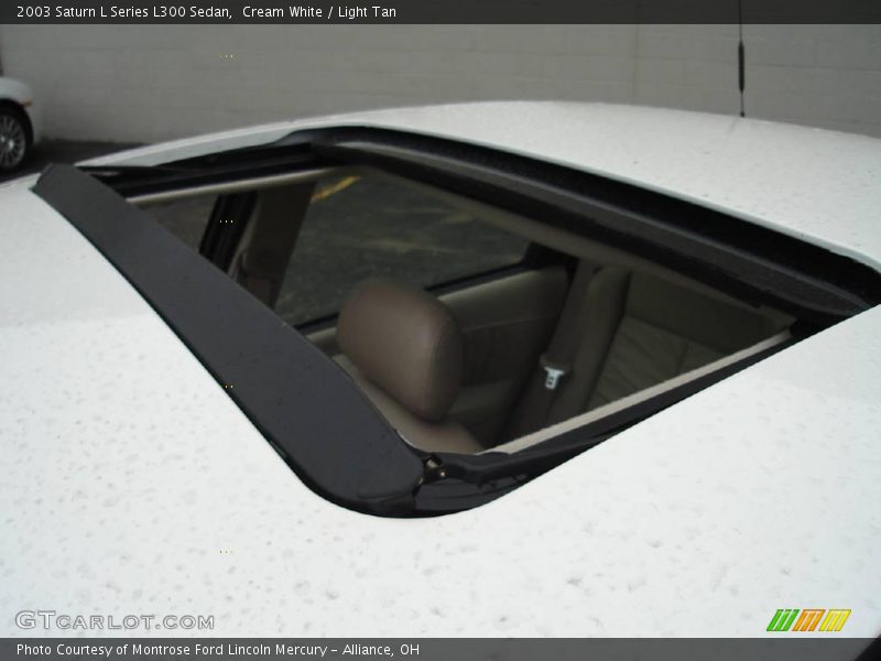 Cream White / Light Tan 2003 Saturn L Series L300 Sedan