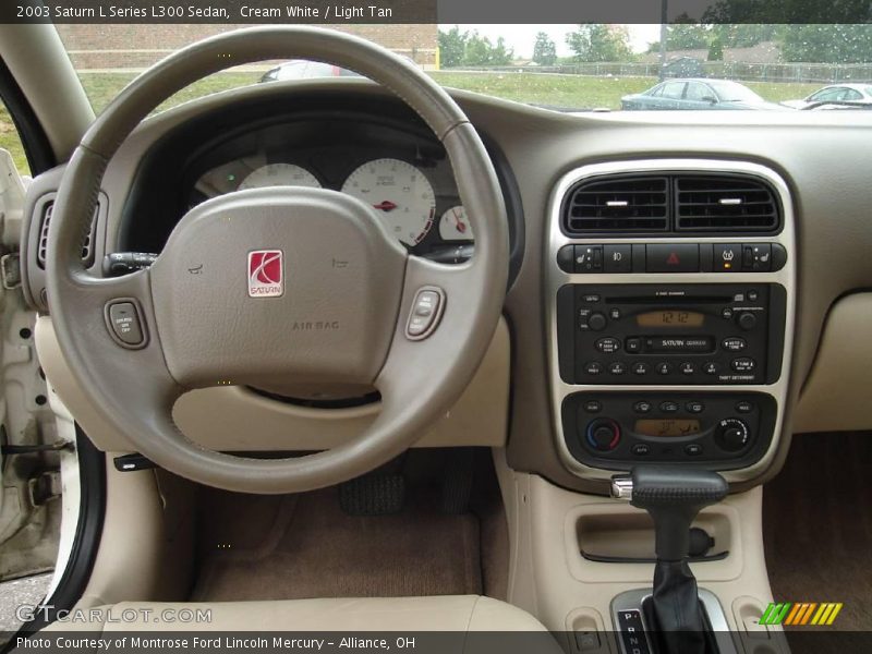 Cream White / Light Tan 2003 Saturn L Series L300 Sedan