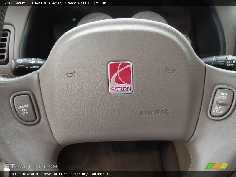 Cream White / Light Tan 2003 Saturn L Series L300 Sedan