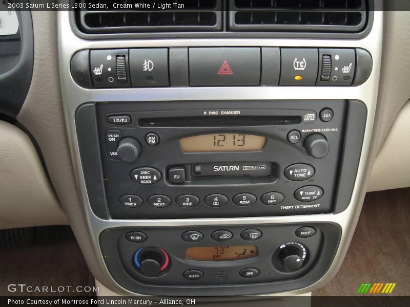 Cream White / Light Tan 2003 Saturn L Series L300 Sedan