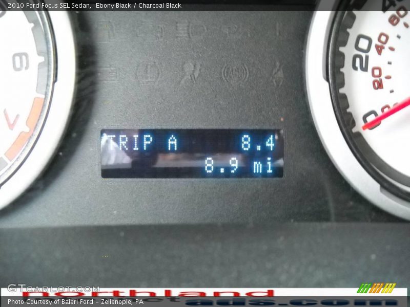 Ebony Black / Charcoal Black 2010 Ford Focus SEL Sedan