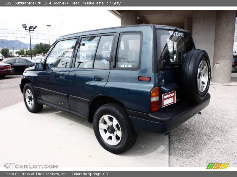 Medium Blue Metallic / Gray 1995 Suzuki Sidekick JLX 4 Door 4x4