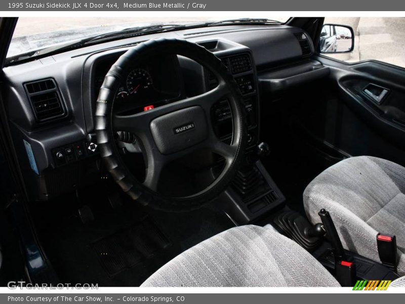 Medium Blue Metallic / Gray 1995 Suzuki Sidekick JLX 4 Door 4x4