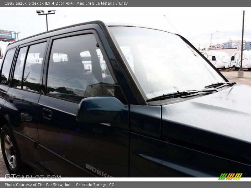 Medium Blue Metallic / Gray 1995 Suzuki Sidekick JLX 4 Door 4x4