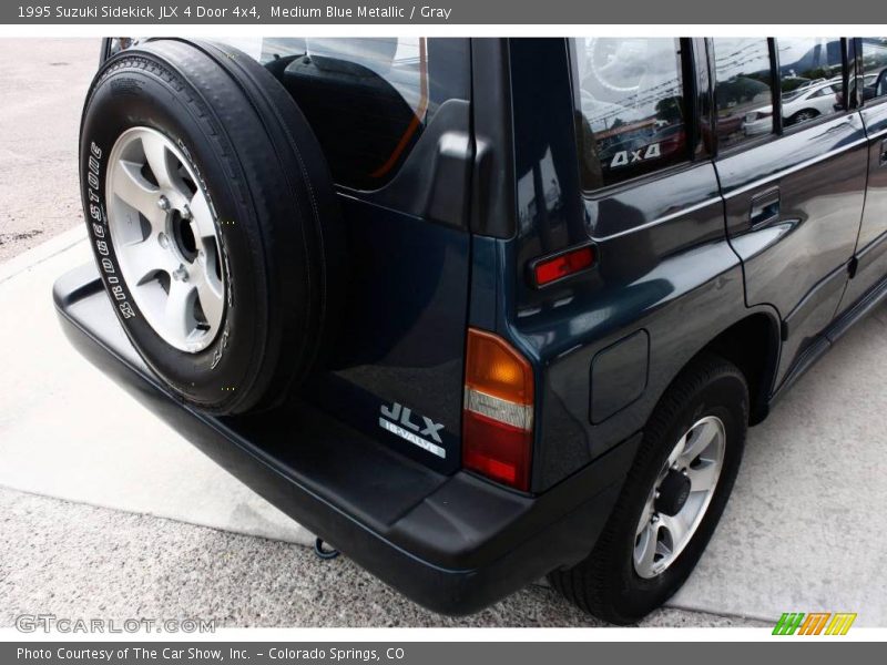 Medium Blue Metallic / Gray 1995 Suzuki Sidekick JLX 4 Door 4x4