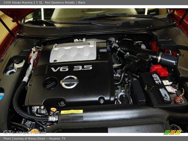 Red Opulence Metallic / Black 2006 Nissan Maxima 3.5 SE