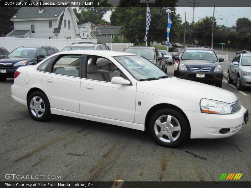 Cream White / Light Tan 2004 Saturn L300 1 Sedan