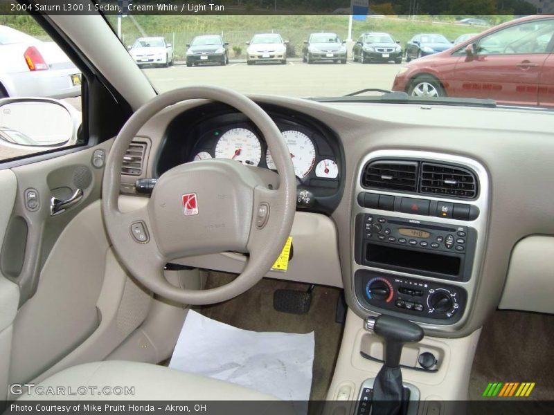 Cream White / Light Tan 2004 Saturn L300 1 Sedan