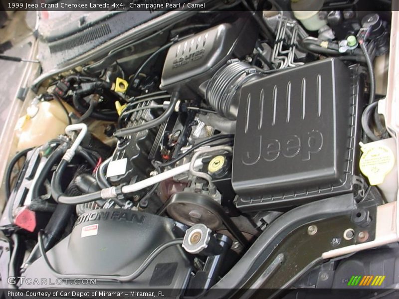 Champagne Pearl / Camel 1999 Jeep Grand Cherokee Laredo 4x4