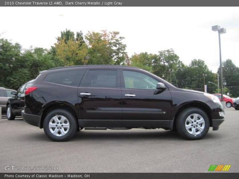 Dark Cherry Metallic / Light Gray 2010 Chevrolet Traverse LS AWD