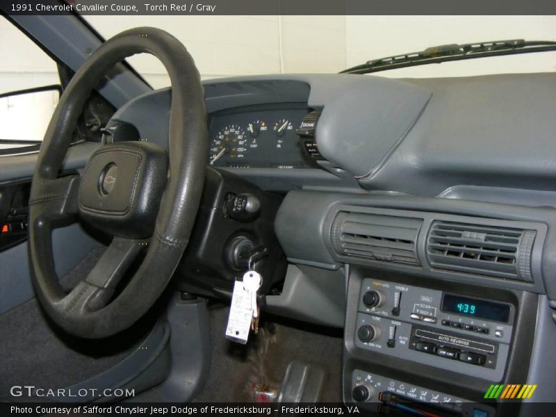 Torch Red / Gray 1991 Chevrolet Cavalier Coupe
