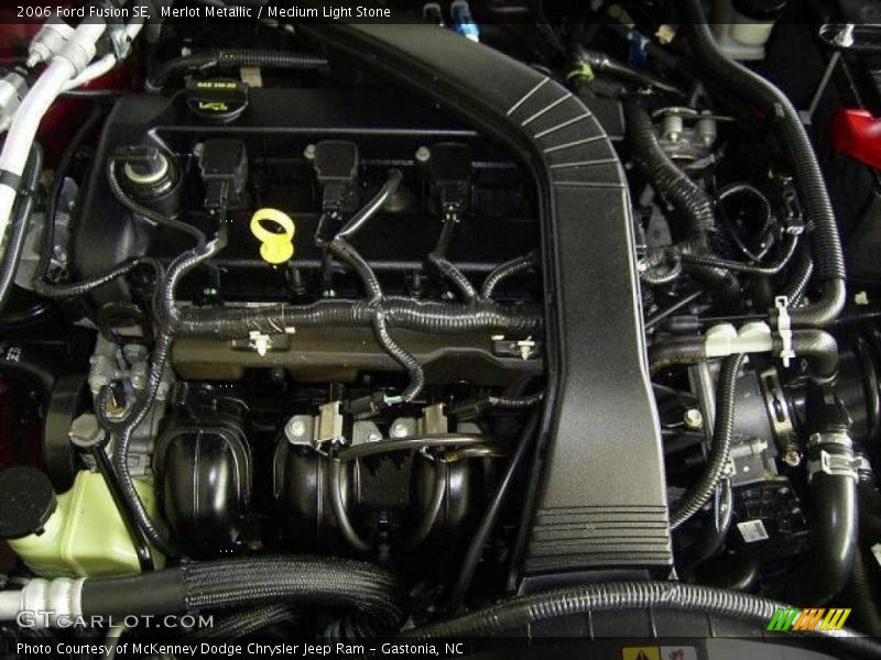 Merlot Metallic / Medium Light Stone 2006 Ford Fusion SE