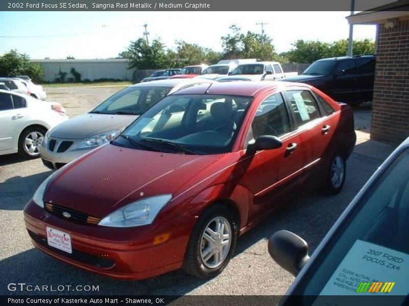 Sangria Red Metallic / Medium Graphite 2002 Ford Focus SE Sedan