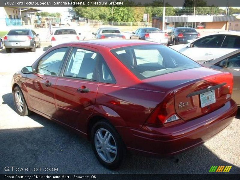 Sangria Red Metallic / Medium Graphite 2002 Ford Focus SE Sedan