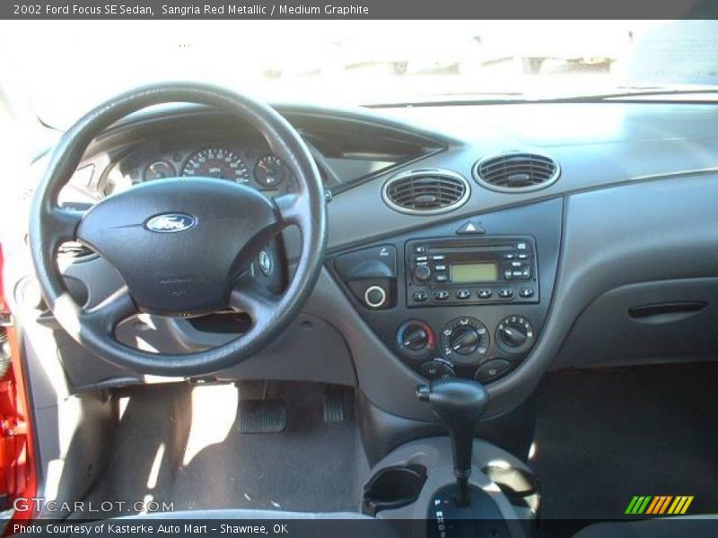 Sangria Red Metallic / Medium Graphite 2002 Ford Focus SE Sedan