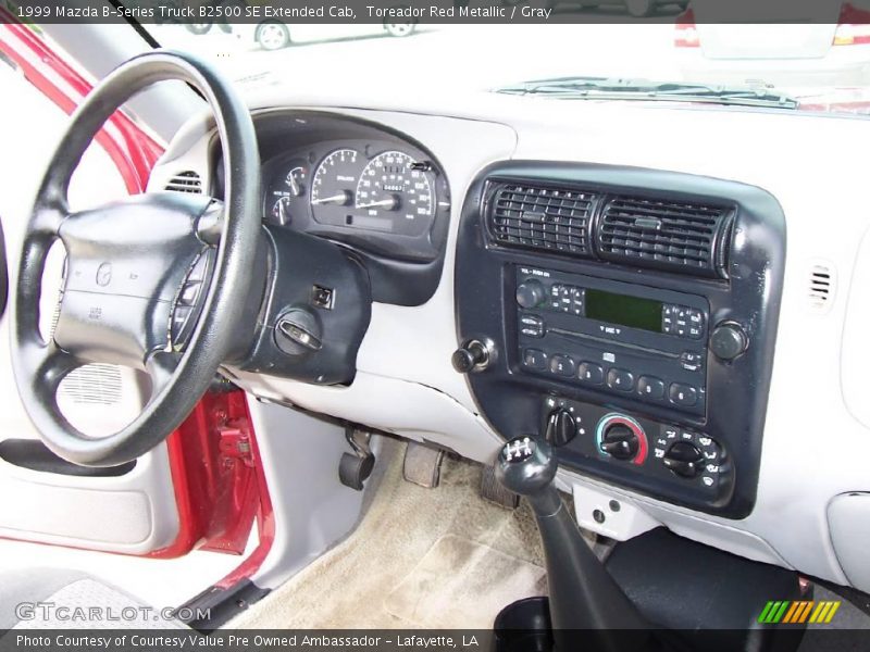 Toreador Red Metallic / Gray 1999 Mazda B-Series Truck B2500 SE Extended Cab
