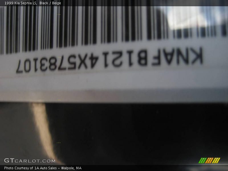 Black / Beige 1999 Kia Sephia LS