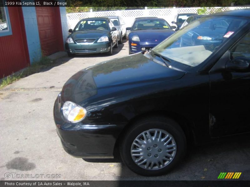 Black / Beige 1999 Kia Sephia LS