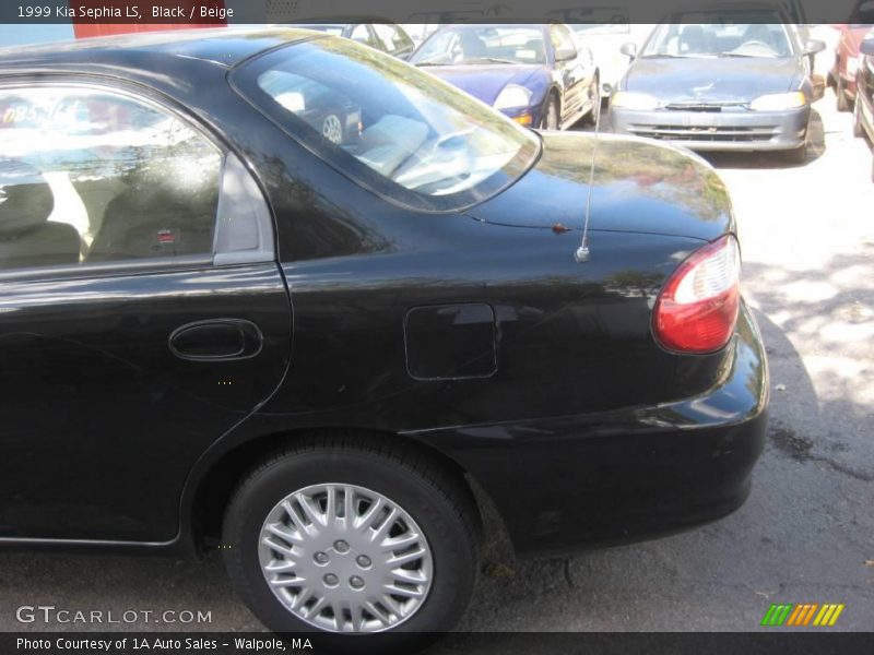Black / Beige 1999 Kia Sephia LS