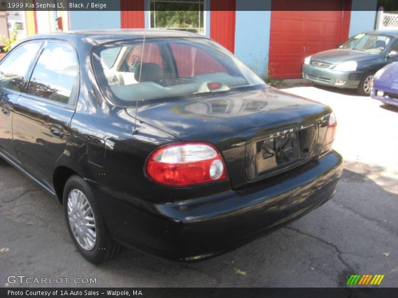Black / Beige 1999 Kia Sephia LS