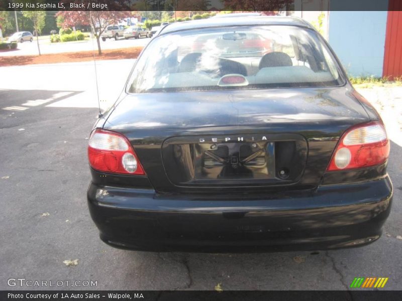 Black / Beige 1999 Kia Sephia LS