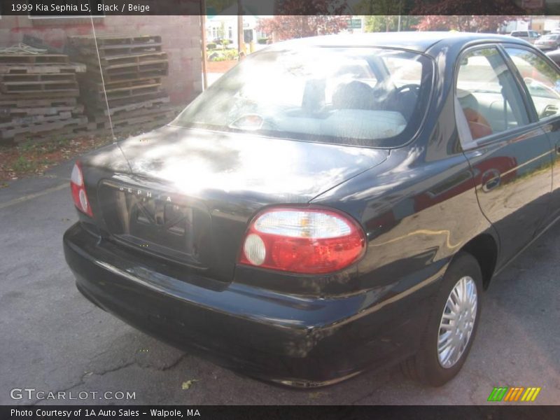 Black / Beige 1999 Kia Sephia LS