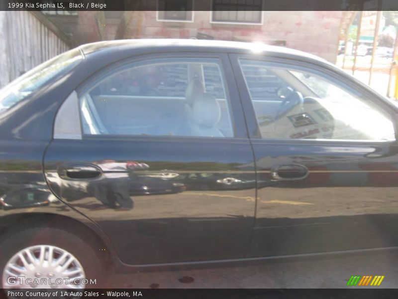 Black / Beige 1999 Kia Sephia LS