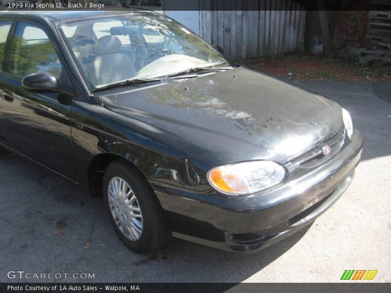 Black / Beige 1999 Kia Sephia LS