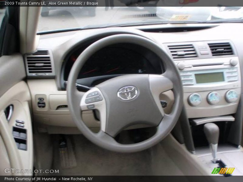 Aloe Green Metallic / Bisque 2009 Toyota Camry LE