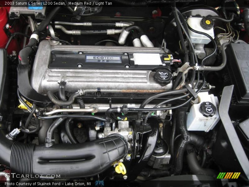 Medium Red / Light Tan 2003 Saturn L Series L200 Sedan