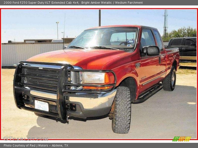 Bright Amber Metallic / Medium Parchment 2000 Ford F250 Super Duty XLT Extended Cab 4x4