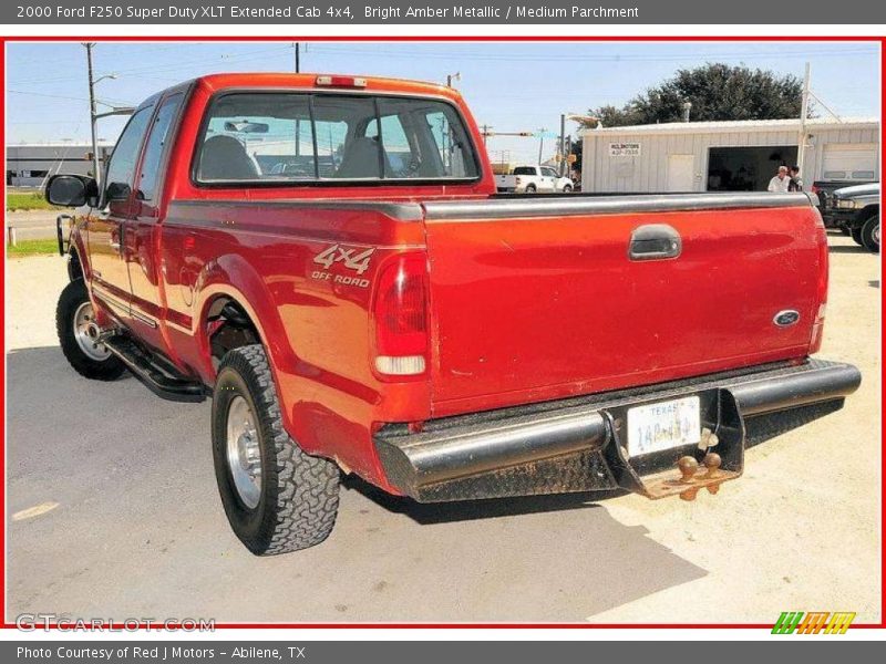 Bright Amber Metallic / Medium Parchment 2000 Ford F250 Super Duty XLT Extended Cab 4x4