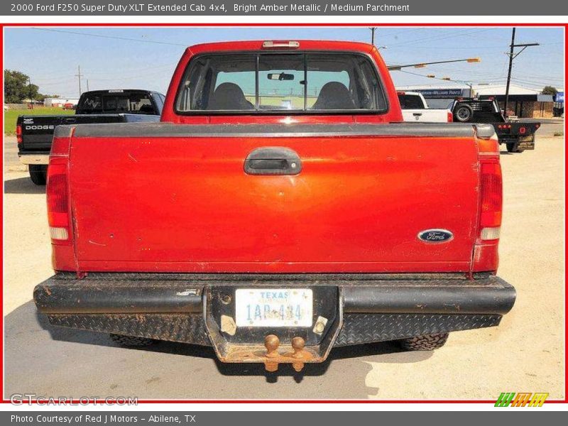 Bright Amber Metallic / Medium Parchment 2000 Ford F250 Super Duty XLT Extended Cab 4x4