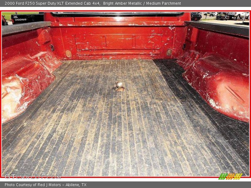 Bright Amber Metallic / Medium Parchment 2000 Ford F250 Super Duty XLT Extended Cab 4x4