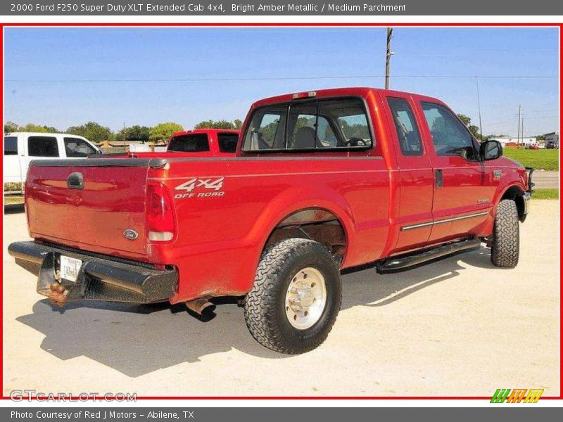 Bright Amber Metallic / Medium Parchment 2000 Ford F250 Super Duty XLT Extended Cab 4x4