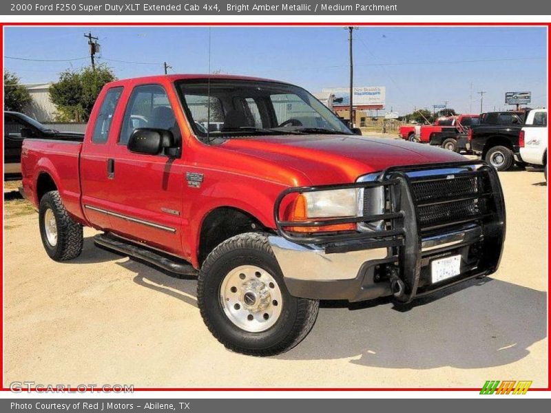 Bright Amber Metallic / Medium Parchment 2000 Ford F250 Super Duty XLT Extended Cab 4x4