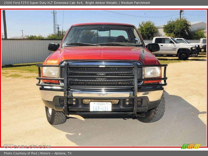 Bright Amber Metallic / Medium Parchment 2000 Ford F250 Super Duty XLT Extended Cab 4x4