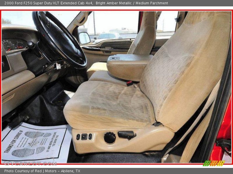 Bright Amber Metallic / Medium Parchment 2000 Ford F250 Super Duty XLT Extended Cab 4x4