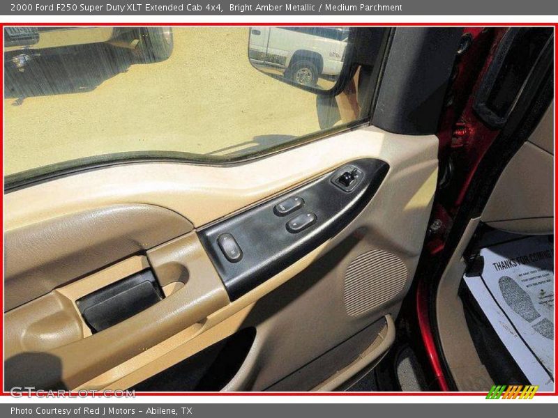 Bright Amber Metallic / Medium Parchment 2000 Ford F250 Super Duty XLT Extended Cab 4x4