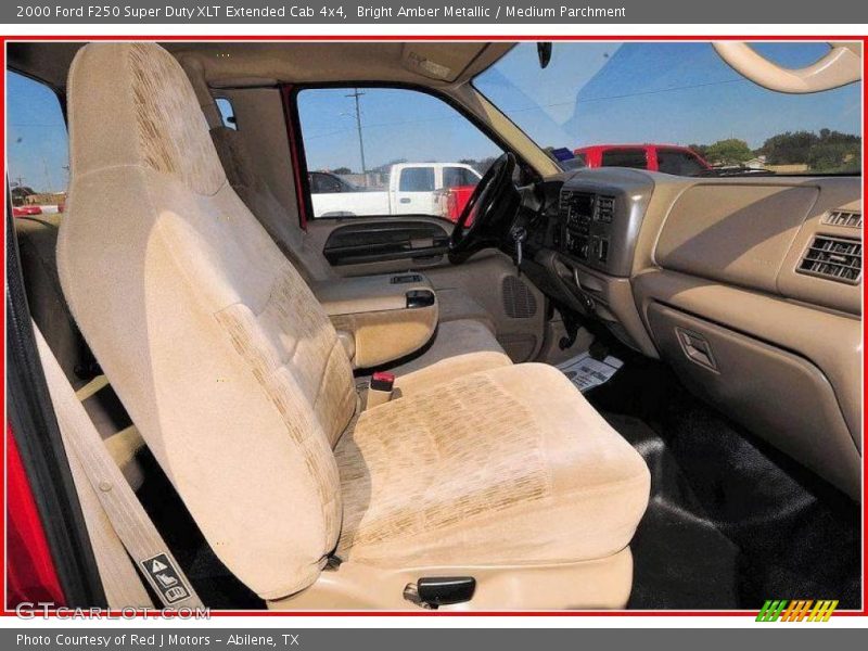 Bright Amber Metallic / Medium Parchment 2000 Ford F250 Super Duty XLT Extended Cab 4x4