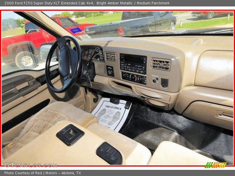 Bright Amber Metallic / Medium Parchment 2000 Ford F250 Super Duty XLT Extended Cab 4x4