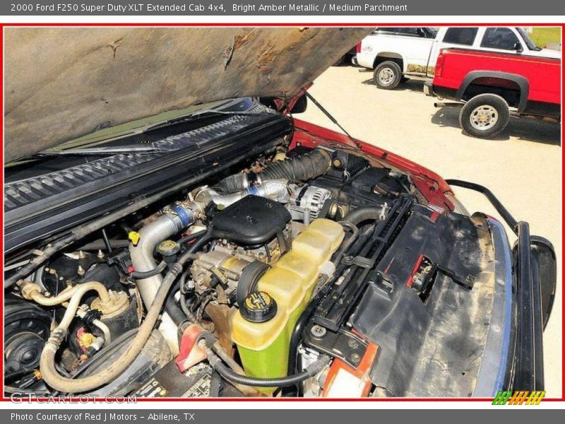 Bright Amber Metallic / Medium Parchment 2000 Ford F250 Super Duty XLT Extended Cab 4x4