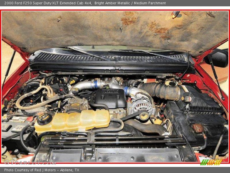 Bright Amber Metallic / Medium Parchment 2000 Ford F250 Super Duty XLT Extended Cab 4x4