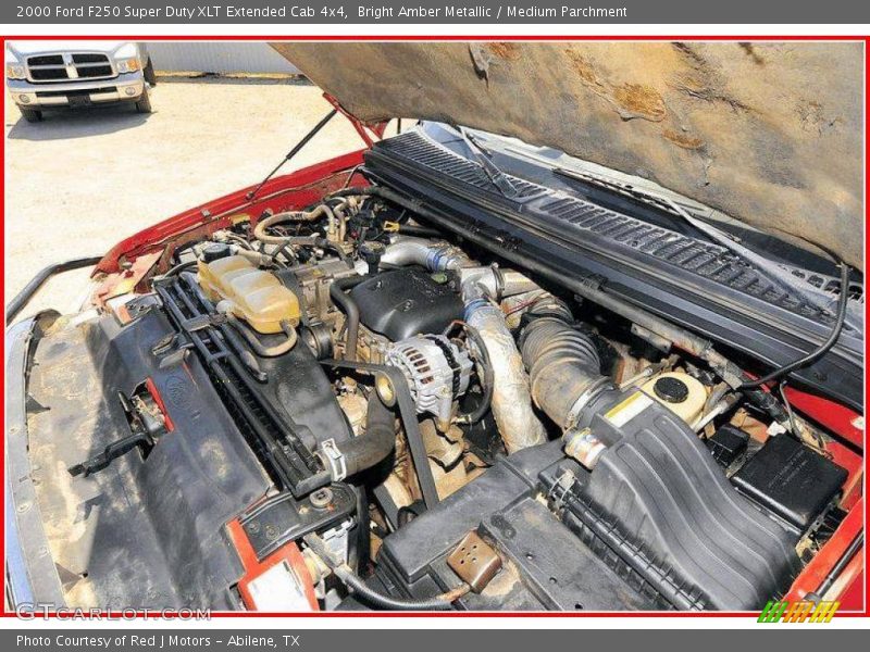 Bright Amber Metallic / Medium Parchment 2000 Ford F250 Super Duty XLT Extended Cab 4x4
