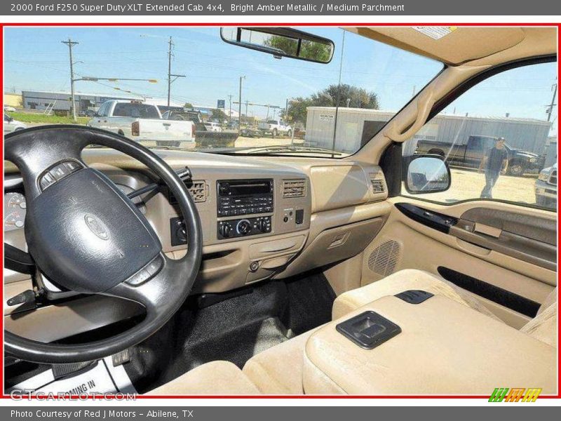 Bright Amber Metallic / Medium Parchment 2000 Ford F250 Super Duty XLT Extended Cab 4x4