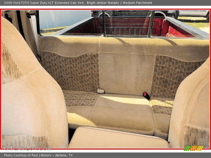 Bright Amber Metallic / Medium Parchment 2000 Ford F250 Super Duty XLT Extended Cab 4x4