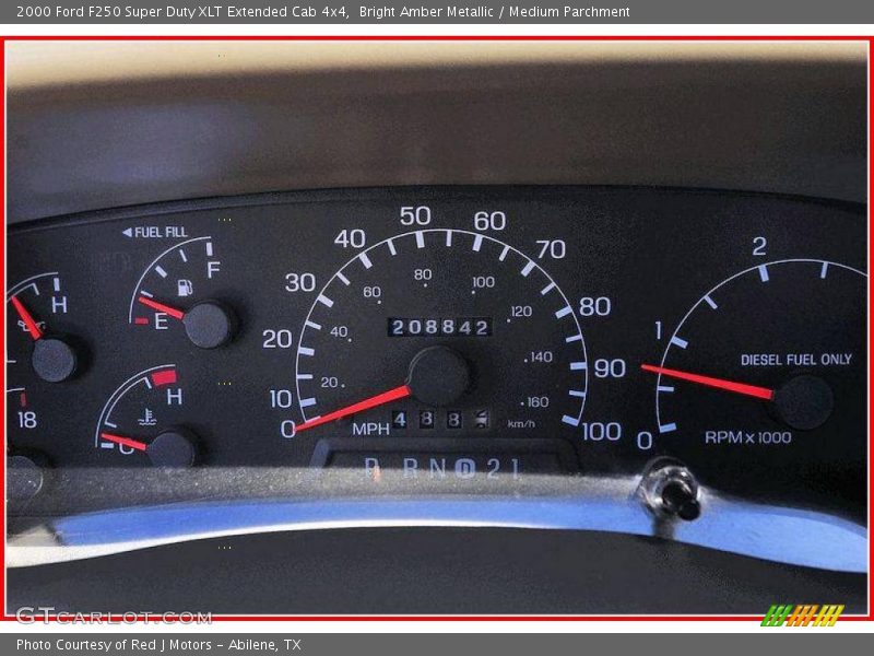 Bright Amber Metallic / Medium Parchment 2000 Ford F250 Super Duty XLT Extended Cab 4x4