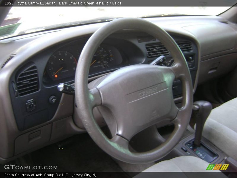 Dark Emerald Green Metallic / Beige 1995 Toyota Camry LE Sedan