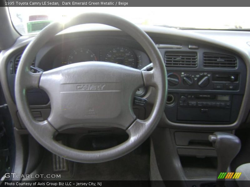 Dark Emerald Green Metallic / Beige 1995 Toyota Camry LE Sedan